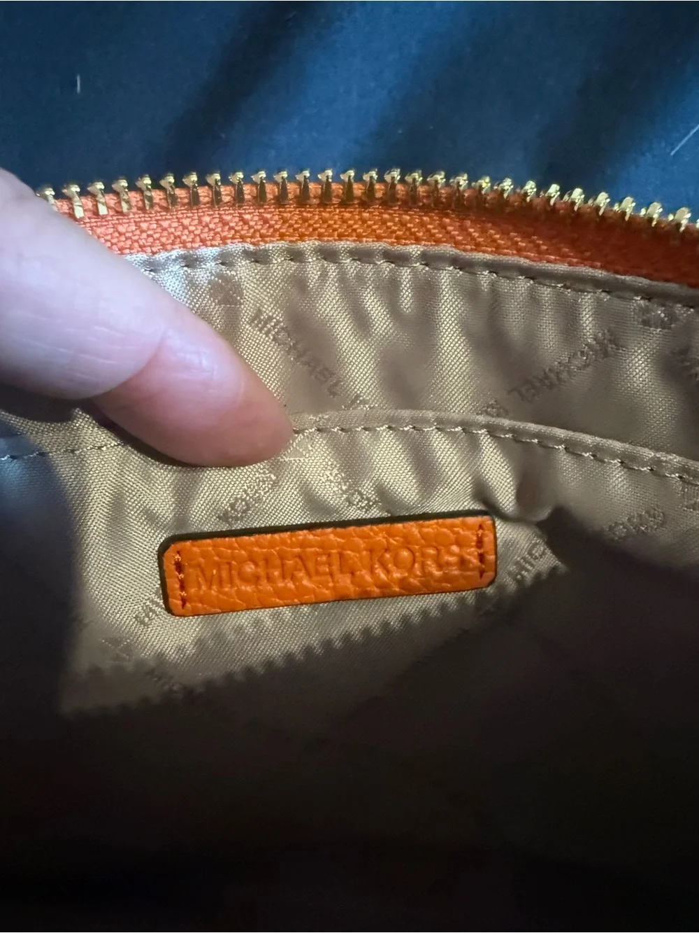Michael Kors Orange Pebbled Leather Wristlet Clutch